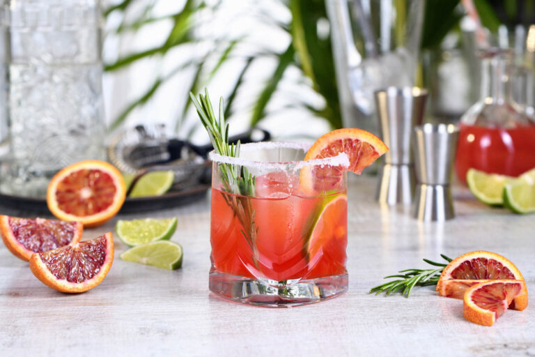 Fruity cocktail in glass with fruit