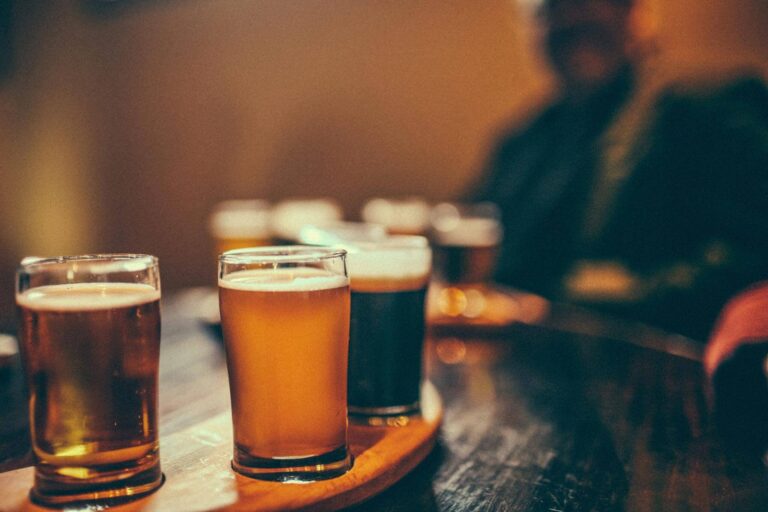 Variety of beers and ciders in a pub.