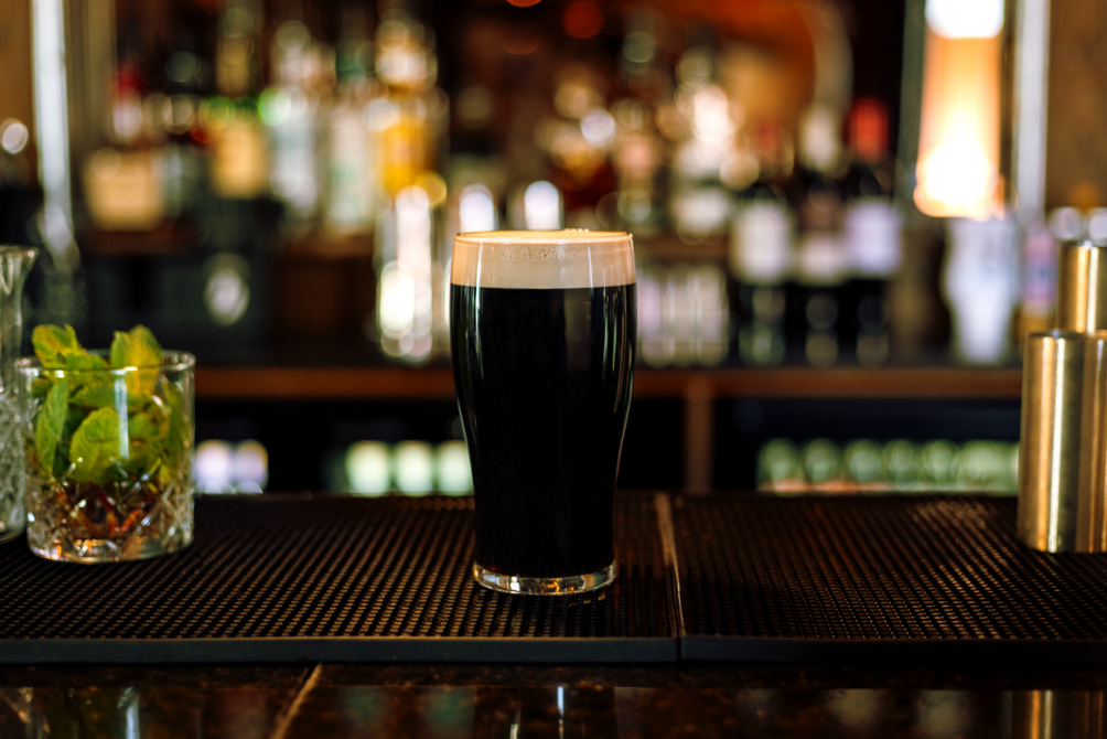 Pint of stout on a bar